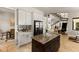 Open concept kitchen with island and modern finishes at 696 Regatta Way, Bradenton, FL 34208