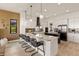 Modern kitchen with stainless steel appliances and expansive island at 696 Regatta Way, Bradenton, FL 34208