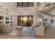 Living room with sunset views and comfortable seating at 696 Regatta Way, Bradenton, FL 34208