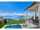 Stunning pool with water view and patio furniture at 696 Regatta Way, Bradenton, FL 34208