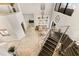 Upstairs landing provides a view of the main living area and staircase at 696 Regatta Way, Bradenton, FL 34208