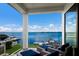 Relaxing waterfront patio furniture with amazing water views at 696 Regatta Way, Bradenton, FL 34208