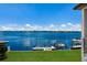 Expansive waterfront view with boats and dock at 696 Regatta Way, Bradenton, FL 34208