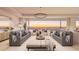 Spacious living room with ocean views and comfortable seating at 70 Avenida Veneccia # 204, Sarasota, FL 34242