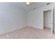 Well-lit bedroom with carpet, door to closet, and ceiling fan at 7228 Great Egret Blvd, Sarasota, FL 34241