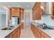 Modern kitchen with stainless steel appliances and granite countertops at 7228 Great Egret Blvd, Sarasota, FL 34241