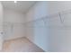 Spacious walk-in closet with ample shelving and hanging space at 7228 Great Egret Blvd, Sarasota, FL 34241