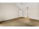 Bright bedroom with carpet flooring and access to bathroom at 7505 4Th W Ave # 7505, Bradenton, FL 34209