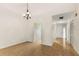 Condo dining area with tile flooring and chandelier at 7505 4Th W Ave # 7505, Bradenton, FL 34209