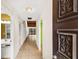View down a condo entry hallway into living area at 7505 4Th W Ave # 7505, Bradenton, FL 34209