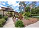 Community entrance with landscaped grounds and walkway at 7505 4Th W Ave # 7505, Bradenton, FL 34209