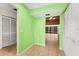 View of kitchen with white cabinets and green walls at 7505 4Th W Ave # 7505, Bradenton, FL 34209