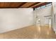 Living area with high ceilings and view of kitchen and entryway at 7505 4Th W Ave # 7505, Bradenton, FL 34209