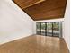 Living room with vaulted wood ceilings and sliding glass doors at 7505 4Th W Ave # 7505, Bradenton, FL 34209