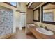 Clean restroom with double sinks and shower at 7505 4Th W Ave # 7505, Bradenton, FL 34209