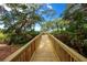 Elevated wooden deck walkway provides access to waterfront views at 7505 4Th W Ave # 7505, Bradenton, FL 34209