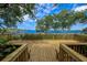 Spacious wooden deck overlooks the calm waters and lush landscape at 7505 4Th W Ave # 7505, Bradenton, FL 34209