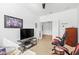 Spacious bedroom with large TV, gaming chairs, and ample closet space at 7521 Ridgelake Cir, Bradenton, FL 34203