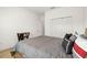 Spacious bedroom with a wooden bed frame and large closet at 7521 Ridgelake Cir, Bradenton, FL 34203