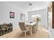 Elegant dining room featuring a table with seating for six and tasteful artwork at 7521 Ridgelake Cir, Bradenton, FL 34203