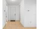 Bright entryway with tile flooring and neutral-colored walls at 7521 Ridgelake Cir, Bradenton, FL 34203