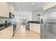 Modern kitchen with stainless steel appliances and granite countertops at 7521 Ridgelake Cir, Bradenton, FL 34203