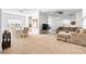 Open floor plan showcasing living, dining, and kitchen areas at 7521 Ridgelake Cir, Bradenton, FL 34203