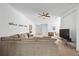 Open living area with comfortable seating, large TV, and plenty of natural light at 7521 Ridgelake Cir, Bradenton, FL 34203