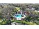Community pool and spa with adjacent cabanas at 7521 Ridgelake Cir, Bradenton, FL 34203