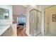 Bathroom with shower stall, vanity, and toilet at 7628 Whitebridge Gln, University Park, FL 34201
