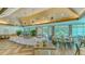 Bright and spacious clubhouse dining area with multiple tables at 7628 Whitebridge Gln, University Park, FL 34201