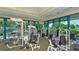 Fitness center with strength training equipment and large windows at 7628 Whitebridge Gln, University Park, FL 34201