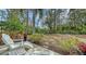 Private backyard with patio and lush landscape at 7741 Whitebridge Gln, University Park, FL 34201