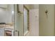 Clean bathroom with a walk-in shower and glass enclosure at 7741 Whitebridge Gln, University Park, FL 34201