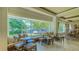 Relaxing lounge area with window seating and views at 7741 Whitebridge Gln, University Park, FL 34201
