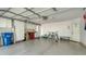Spacious garage with ample storage and flooring at 7741 Whitebridge Gln, University Park, FL 34201