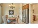 Kitchen features a breakfast nook and stainless steel appliances at 7741 Whitebridge Gln, University Park, FL 34201