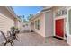 Private brick patio with bistro set, perfect for relaxing at 7741 Whitebridge Gln, University Park, FL 34201