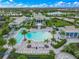 Resort-style pool, clubhouse, and lush landscaping at 8358 Redonda Loop, Lakewood Ranch, FL 34202