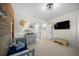 Charming bedroom with nautical theme, crib, and built-in shelving at 8358 Redonda Loop, Lakewood Ranch, FL 34202