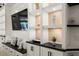 Built-in shelving with TV, niches and storage at 8358 Redonda Loop, Lakewood Ranch, FL 34202