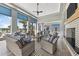 Relaxing outdoor patio area with comfortable seating and fireplace at 8358 Redonda Loop, Lakewood Ranch, FL 34202