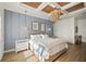 Main bedroom with wood-paneled ceiling and comfortable king-size bed at 8358 Redonda Loop, Lakewood Ranch, FL 34202