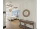 Bright bedroom with light-blue walls and a comfortable king-size bed at 8358 Redonda Loop, Lakewood Ranch, FL 34202