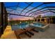 Stunning pool and spa area with a covered lanai and sunset view at 8358 Redonda Loop, Lakewood Ranch, FL 34202