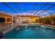 Spacious pool and spa surrounded by a screened enclosure at 8358 Redonda Loop, Bradenton, FL 34202