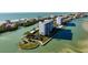 Exclusive waterfront condo complex with private beach access and lush landscaping at 9397 Midnight Pass Rd # 404, Sarasota, FL 34242