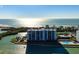 Luxury beachfront condo building with water access and resort-style amenities at 9397 Midnight Pass Rd # 404, Sarasota, FL 34242
