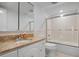 Bathroom with granite countertop and a shower/tub combo at 9397 Midnight Pass Rd # 404, Sarasota, FL 34242