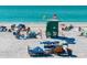 Lifeguard station and beach umbrellas at 9397 Midnight Pass Rd # 404, Sarasota, FL 34242